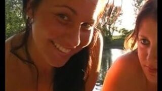 Two babes nice hangers give hj at the lake