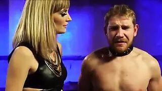 Mistress fucks slave with strapon.