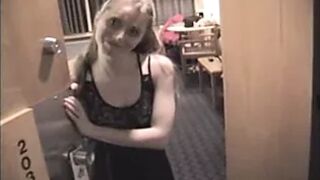Skinny light brunette gal in motel room
