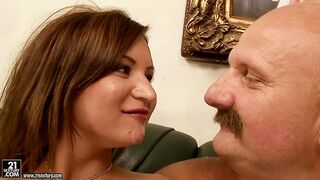Older moustached man with younger woman