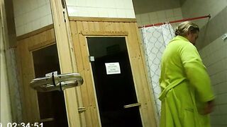 With a 59-year-old mature mother in the sauna.