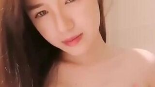 Chinese beauty live ride dildo with her tight ass after stripping
