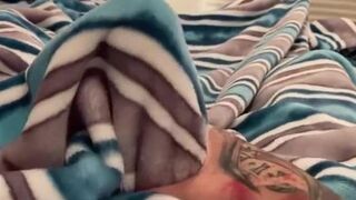 What’s hiding behind the blanket??