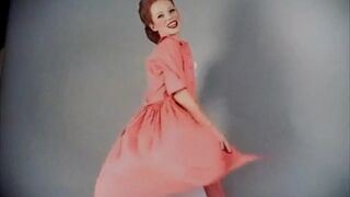 Vintage style, redhead in stockings does striptease