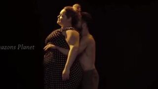 Big Woman Lifts & Carries Little Guy In A Stage Show