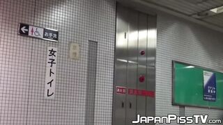 Japanese ladies taped pissing in public bathroom