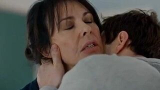 Old woman kissing young man 1