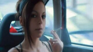 Lady Smokes in Car with Windows Up
