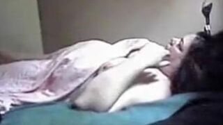 My mother 64 years old masturbates on bed