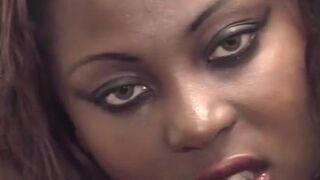 African girl with big tits using fingers to masturbate