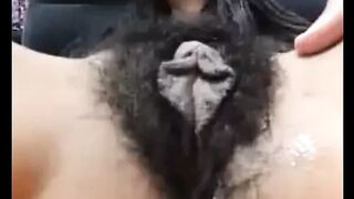 Mature very hairy cunt with long labia