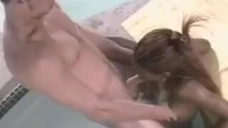 Ebony girl fucks white guy poolside