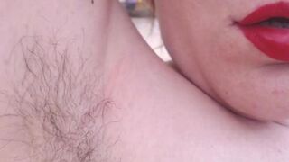 Very close exploration of a beautiful natural hairy pussy