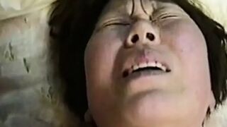 A guy isenjoying to use pussy and anal of Japanese granny