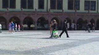 Naked girl has fun in streets