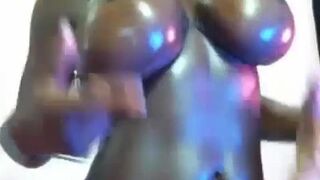 Busty black slut wet oiled show