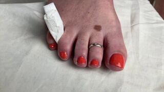 Mrs Mature Feet painting her toes bright Red for you